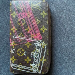 Woman’s Luis Vuitton Purse